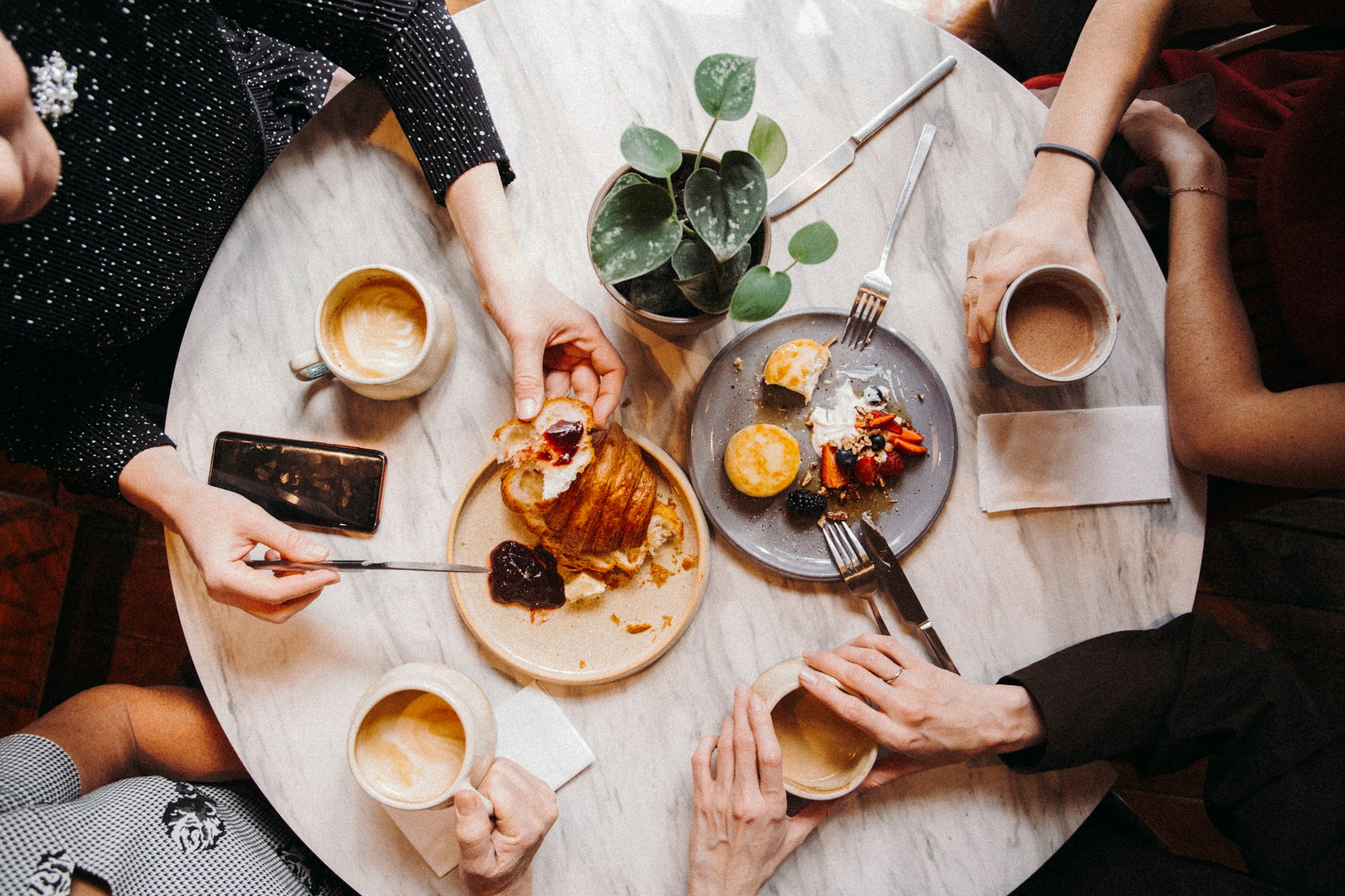 Coffee and brunch around a café table